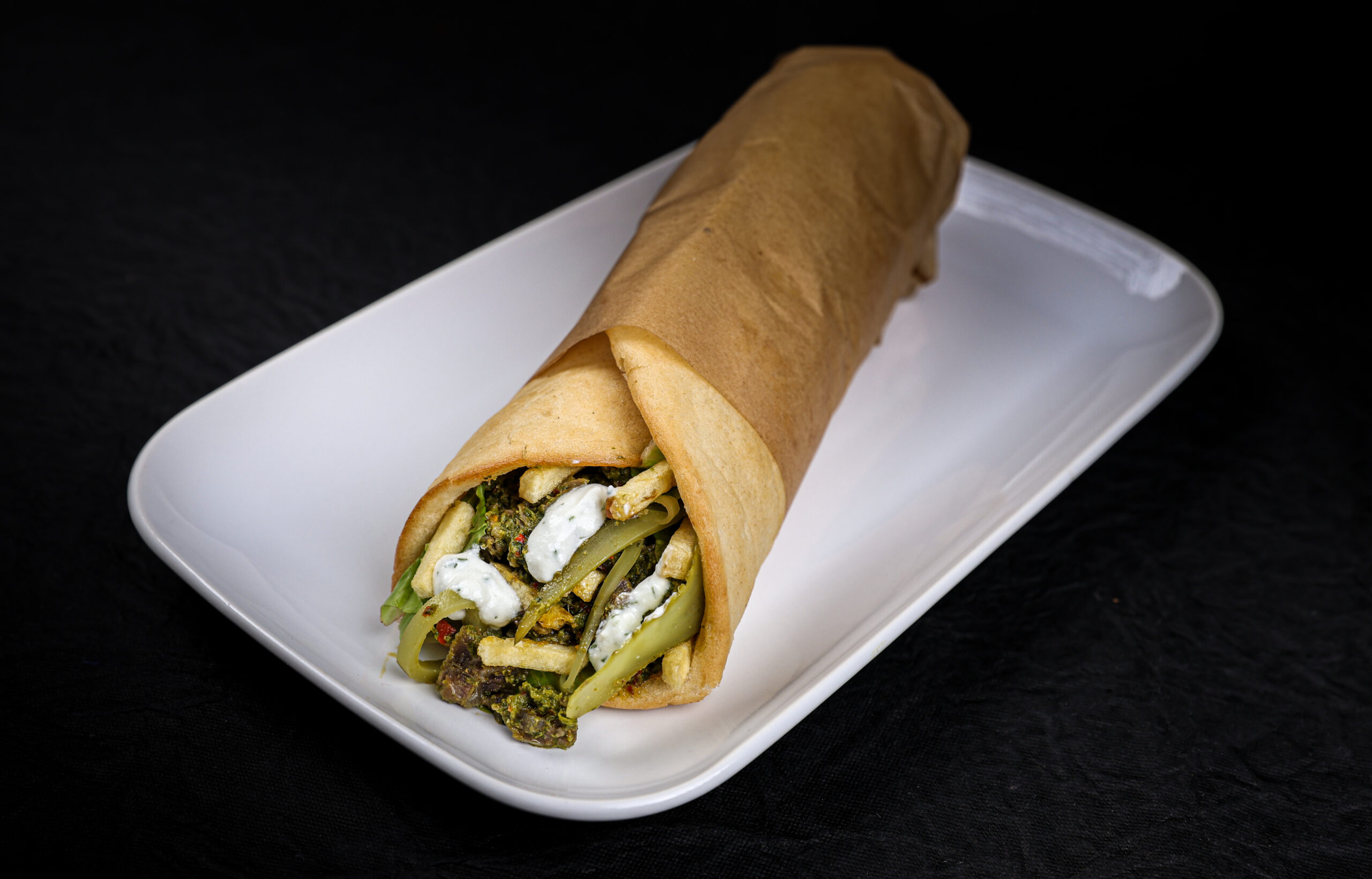 Chermoula Slow Cooked Mutton Wrap with salli potatoes and tzatziki from Tavora Bandra West