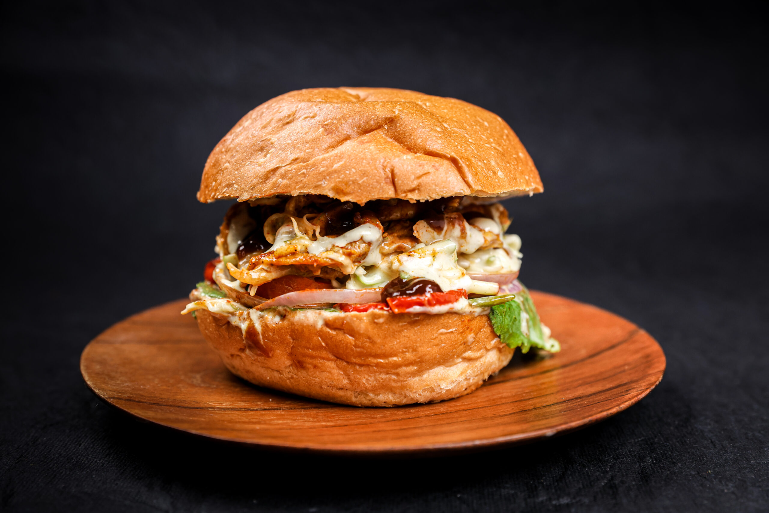Smoked Pulled Peri Peri Chicken Burger, Tavora Bandra West, Smoked food, African flavours, Gourmet wraps, Burgers, Sandwiches, Bowls