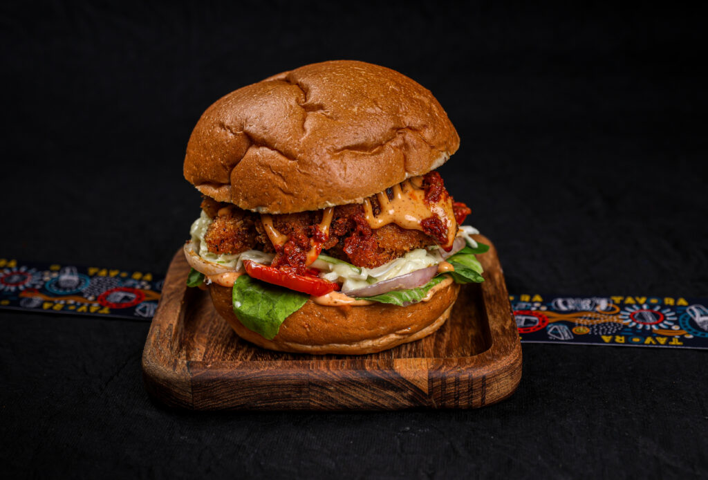 Crispy Berbere Spiced Chicken Burger with Ethiopian spices, Libyan hot sauce and apple slaw – Tavora Bandra West