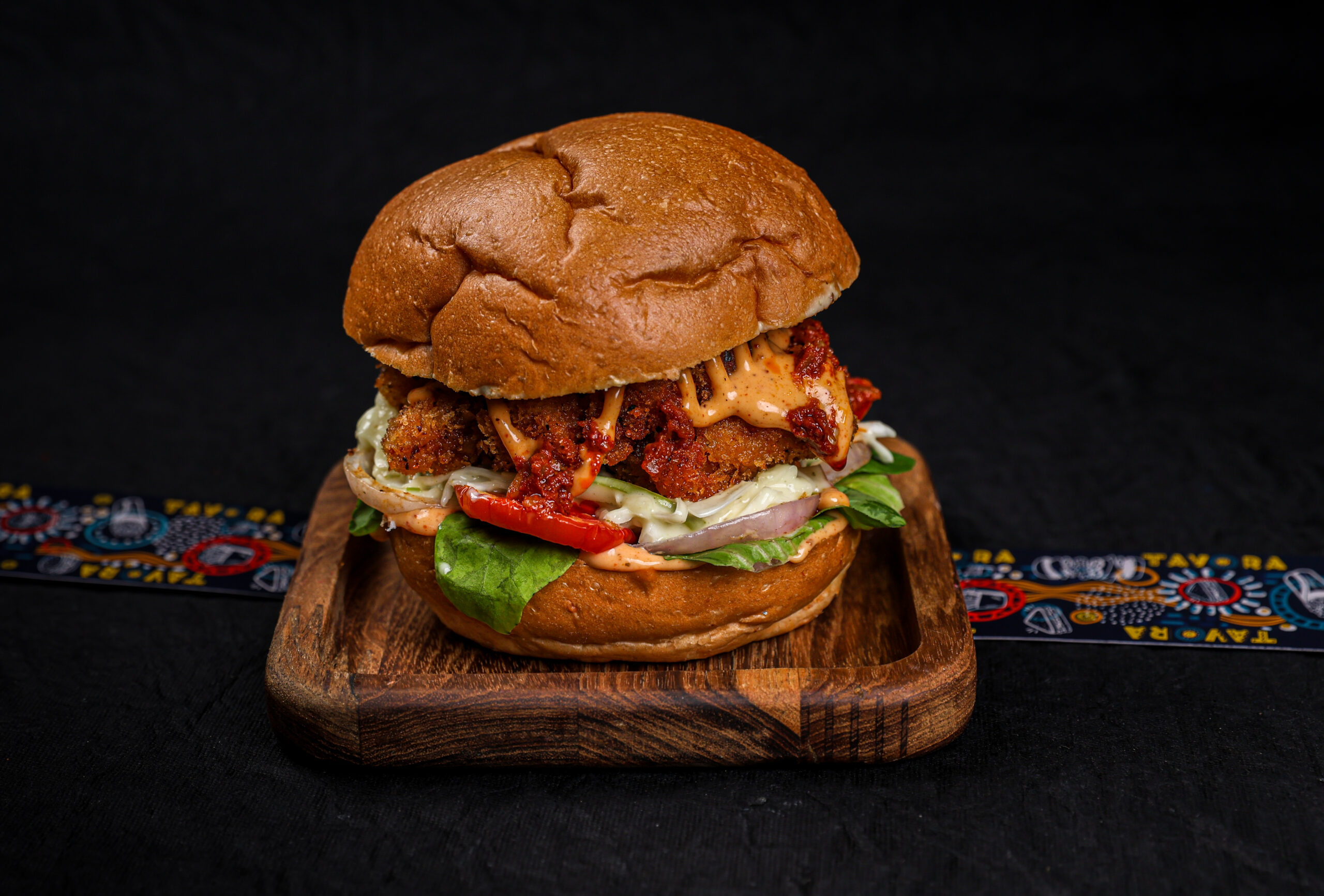 Crispy Berbere Spiced Chicken Burger with Ethiopian spices, Libyan hot sauce and apple slaw – Tavora Bandra West